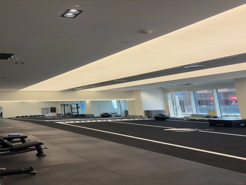 Padded gym turf installation for enhanced gym performance